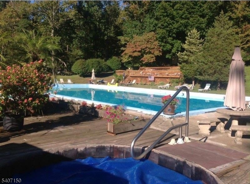 50 Drakestown Road Hackettstown, NJ 07840 - Photo 21 of 47 a view of a backyard with sitting area