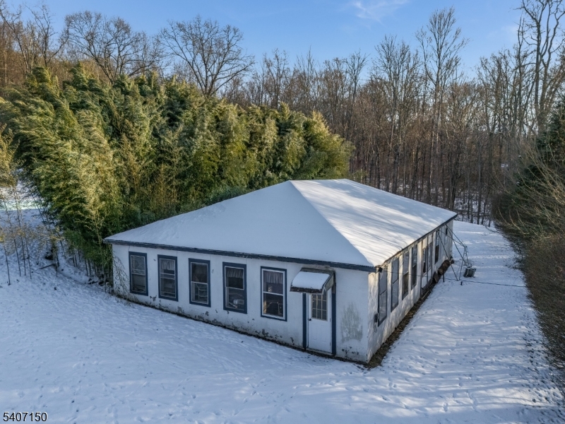50 Drakestown Road Hackettstown, NJ 07840 - Photo 22 of 47 a view of a house with backyard and trees