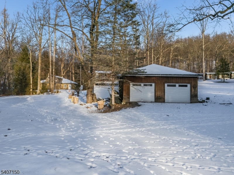 50 Drakestown Road Hackettstown, NJ 07840 - Photo 26 of 47 a view of a house with large outdoor space and a car parked