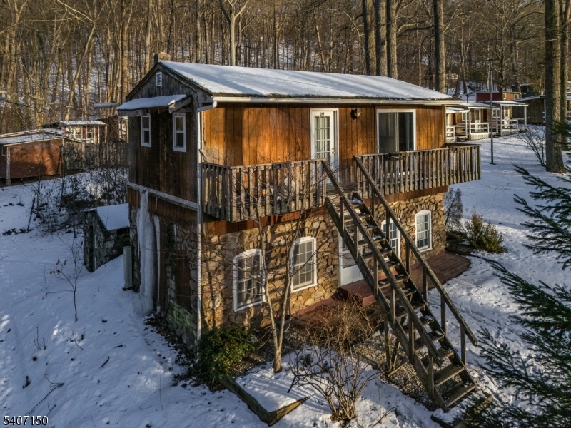 50 Drakestown Road Hackettstown, NJ 07840 - Photo 30 of 47 a front view of a house with yard and furniture