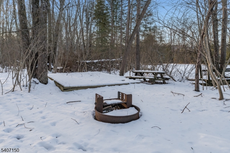 50 Drakestown Road Hackettstown, NJ 07840 - Photo 37 of 47 a view of a swimming pool with a chairs and plants