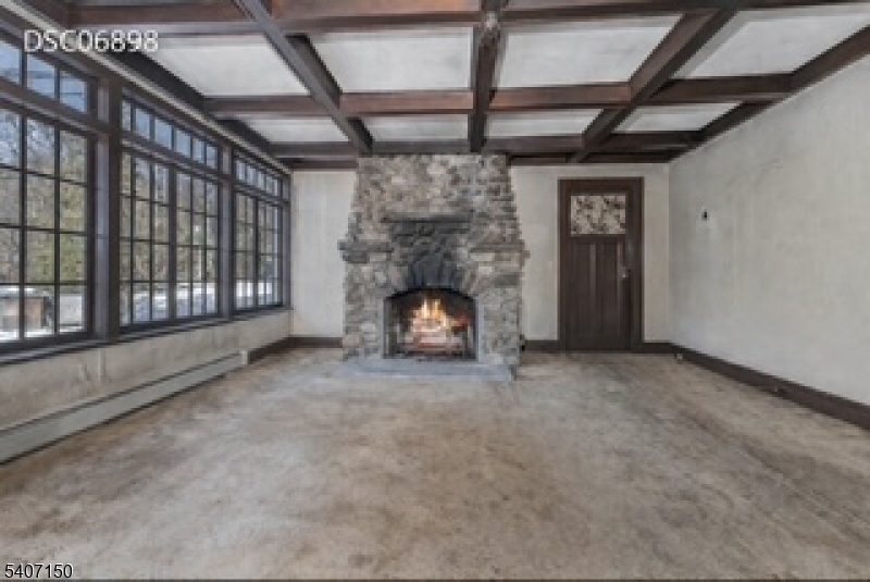 50 Drakestown Road Hackettstown, NJ 07840 - Photo 5 of 47 a living room with furniture and a fireplace