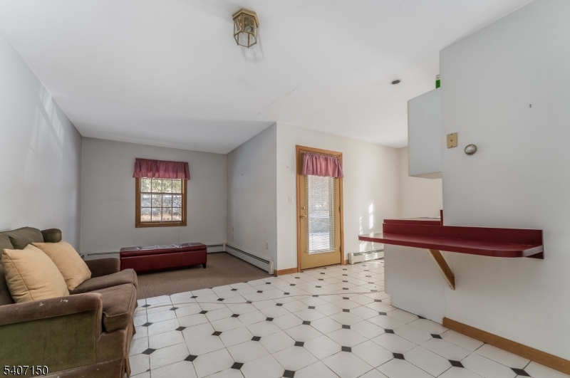 50 Drakestown Road Hackettstown, NJ 07840 - Photo 9 of 47 a living room with furniture and a window