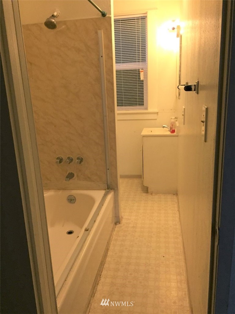 3409 Rockefeller Avenue Everett, WA 98201 - Photo 16 of 31 a bathroom with a bathtub and a shower