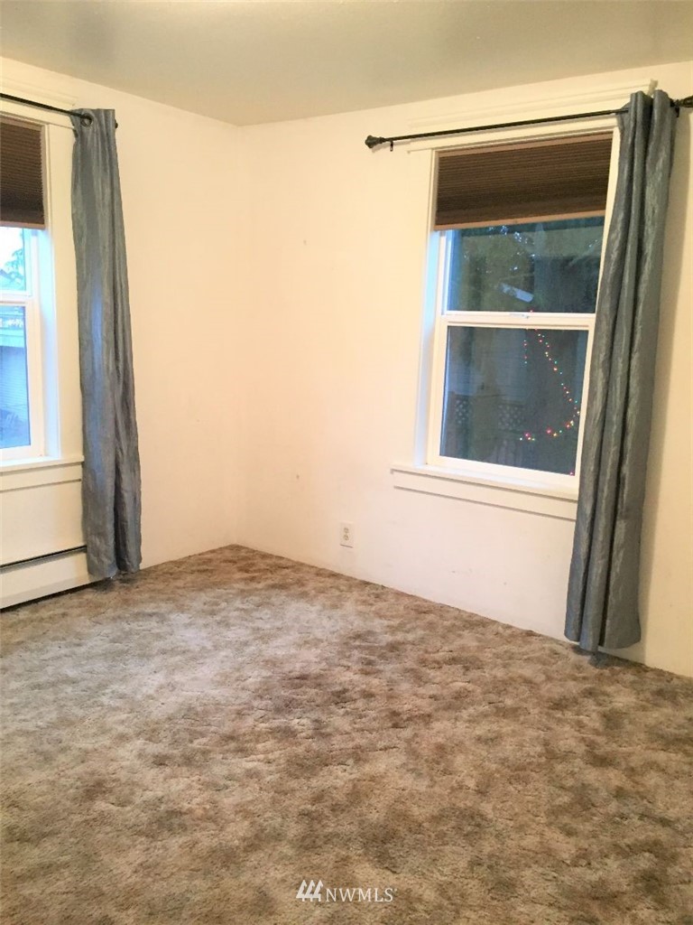 3409 Rockefeller Avenue Everett, WA 98201 - Photo 18 of 31 a view of an empty room with a window