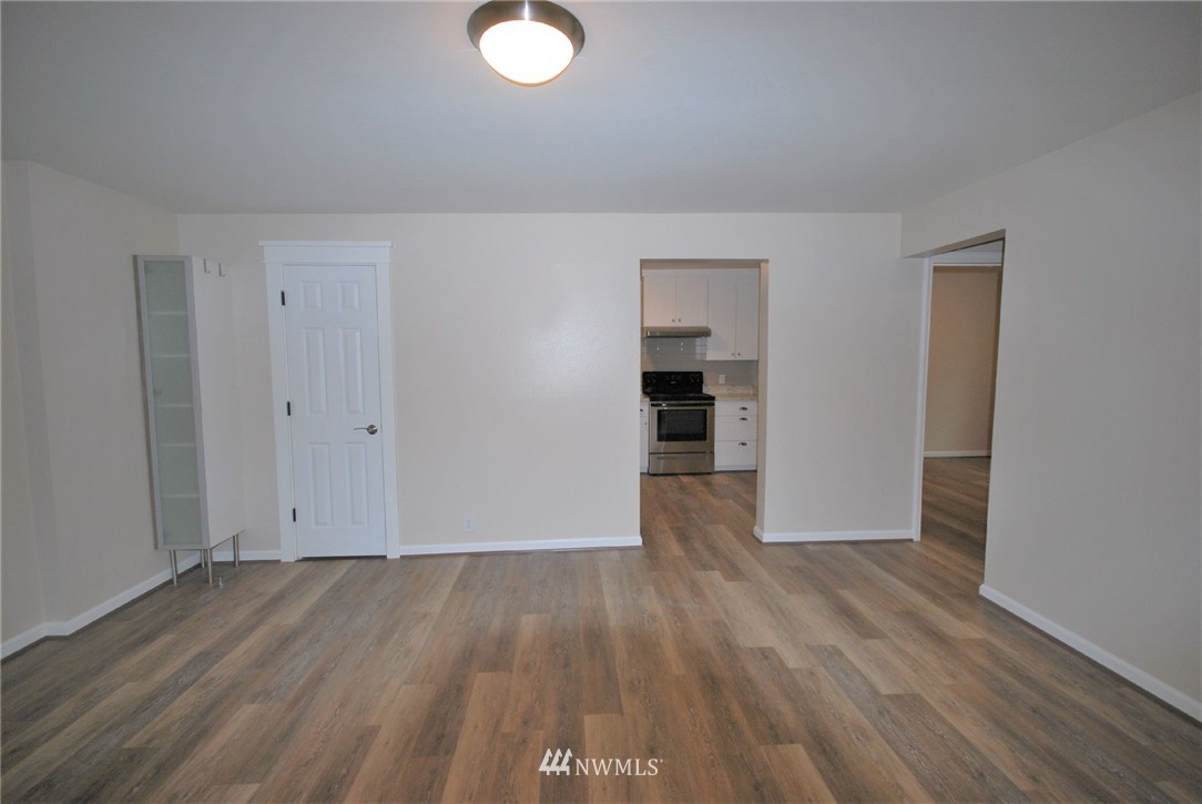 3409 Rockefeller Avenue Everett, WA 98201 - Photo 26 of 31 a view of empty room with wooden floor