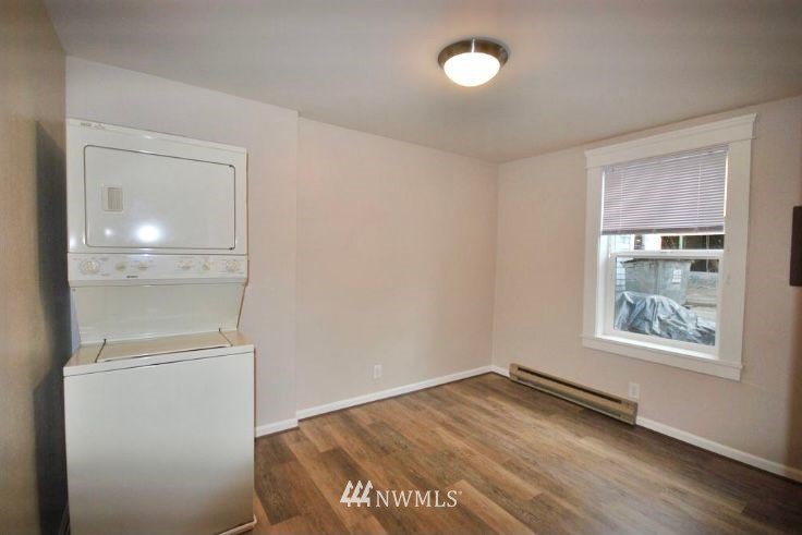 3409 Rockefeller Avenue Everett, WA 98201 - Photo 29 of 31 a view of empty room with wooden floor