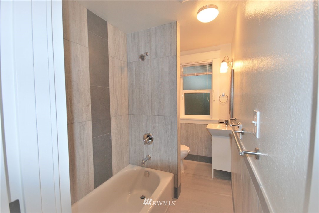3409 Rockefeller Avenue Everett, WA 98201 - Photo 31 of 31 a bathroom with a tub and shower