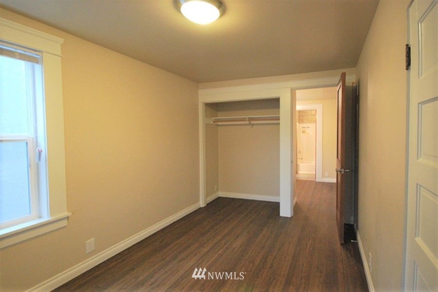 3409 Rockefeller Avenue Everett, WA 98201 - Photo 10 of 31 a view of a small space with wooden floor and a window