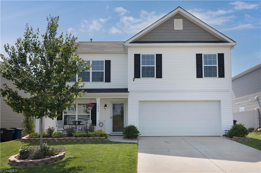 1499 Kilstrom Street Rural Hall, NC 27045 - Photo 1 of 28 Beautifully landscaped; with great porch area!