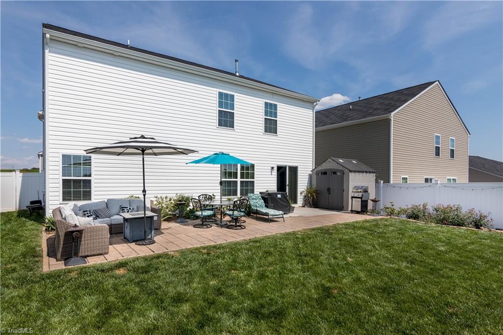 1499 Kilstrom Street Rural Hall, NC 27045 - Photo 4 of 28 This backyard has so much room to enjoy entertaining! Storage Building conveys!