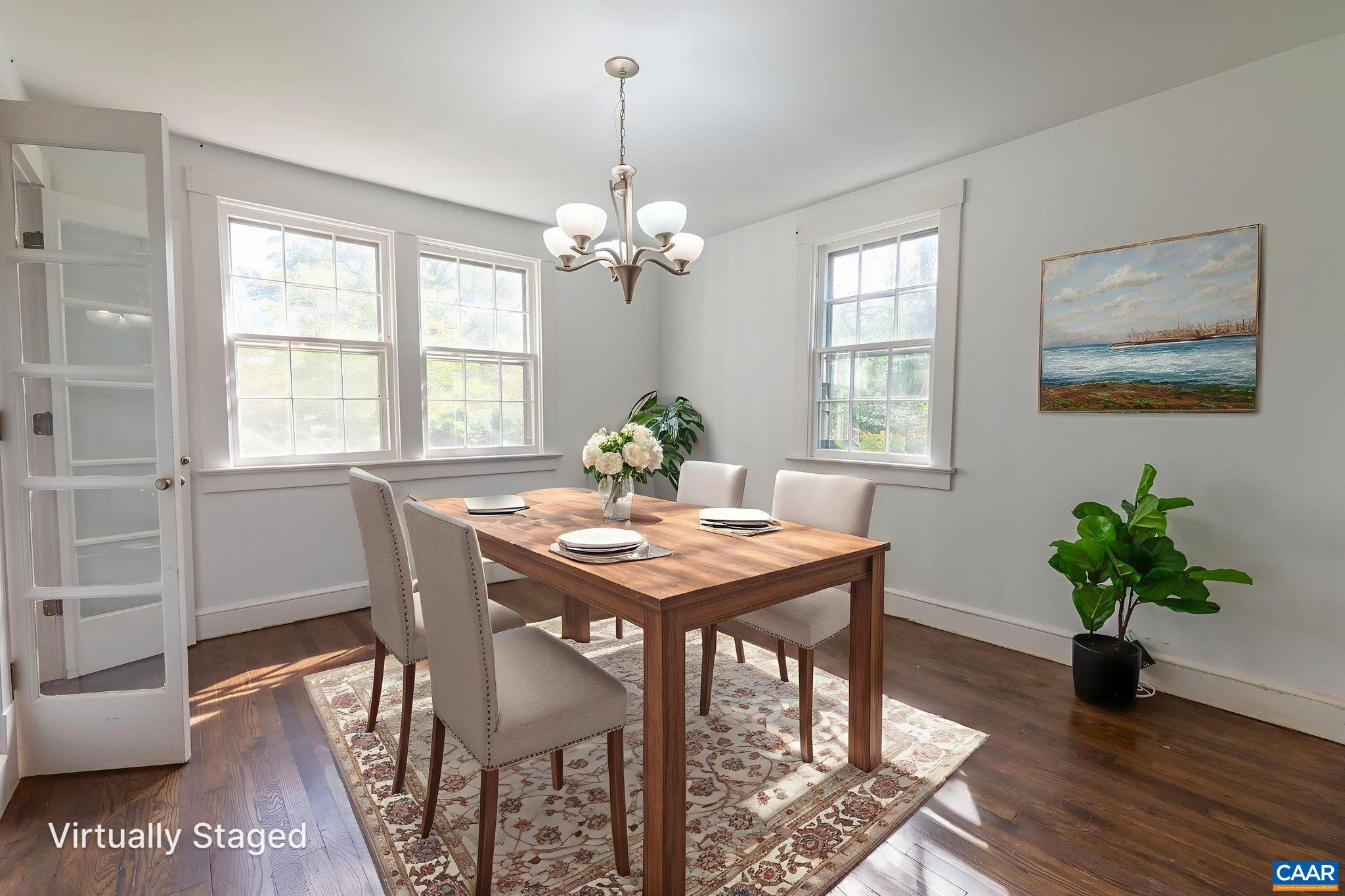 2514 Taylors Gap Road North Garden, VA 22959 - Photo 12 of 75 a view of a dining room with furniture window and wooden floor
