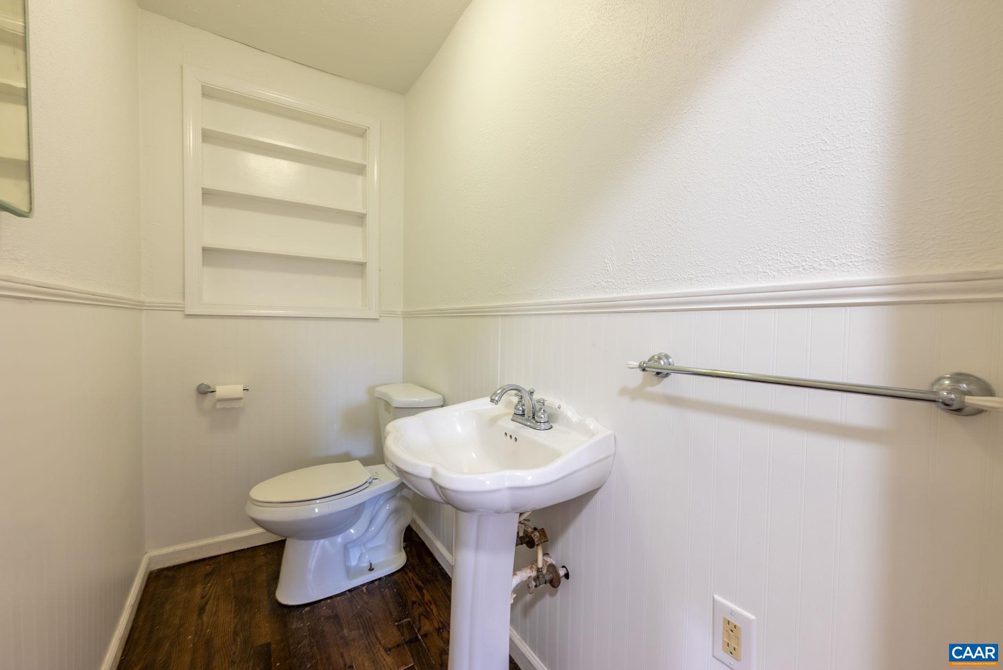 2514 Taylors Gap Road North Garden, VA 22959 - Photo 19 of 75 a bathroom with a sink toilet and a mirror
