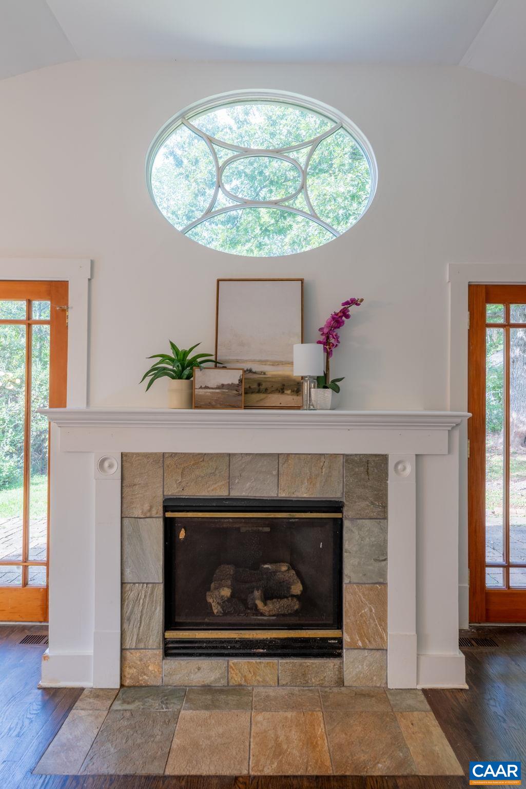 2514 Taylors Gap Road North Garden, VA 22959 - Photo 22 of 75 an entryway with fireplace and wooden floor