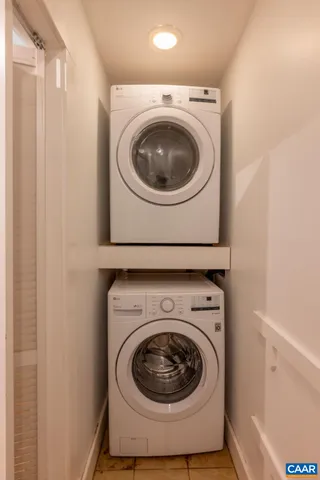 a bathroom with a sink toilet and a mirror