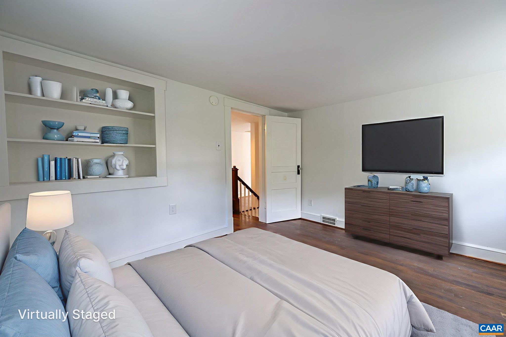 2514 Taylors Gap Road North Garden, VA 22959 - Photo 48 of 75 a bedroom with a bed and a flat screen tv