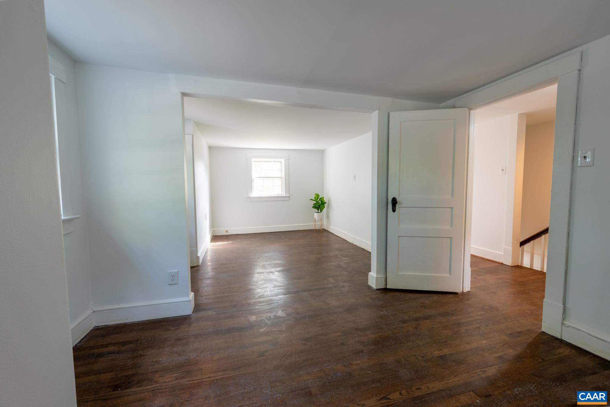 2514 Taylors Gap Road North Garden, VA 22959 - Photo 49 of 75 an empty room with wooden floor and windows