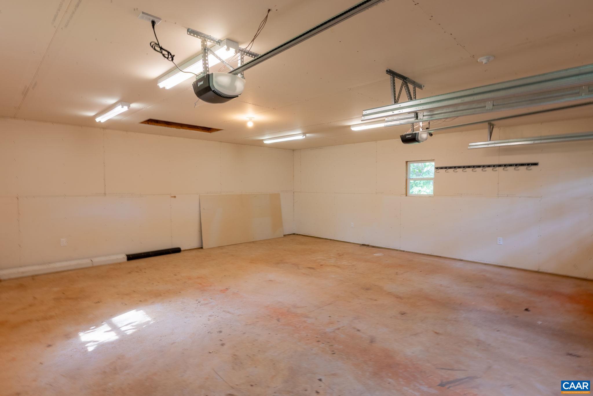 2514 Taylors Gap Road North Garden, VA 22959 - Photo 72 of 75 a view of an empty room with a ceiling fan