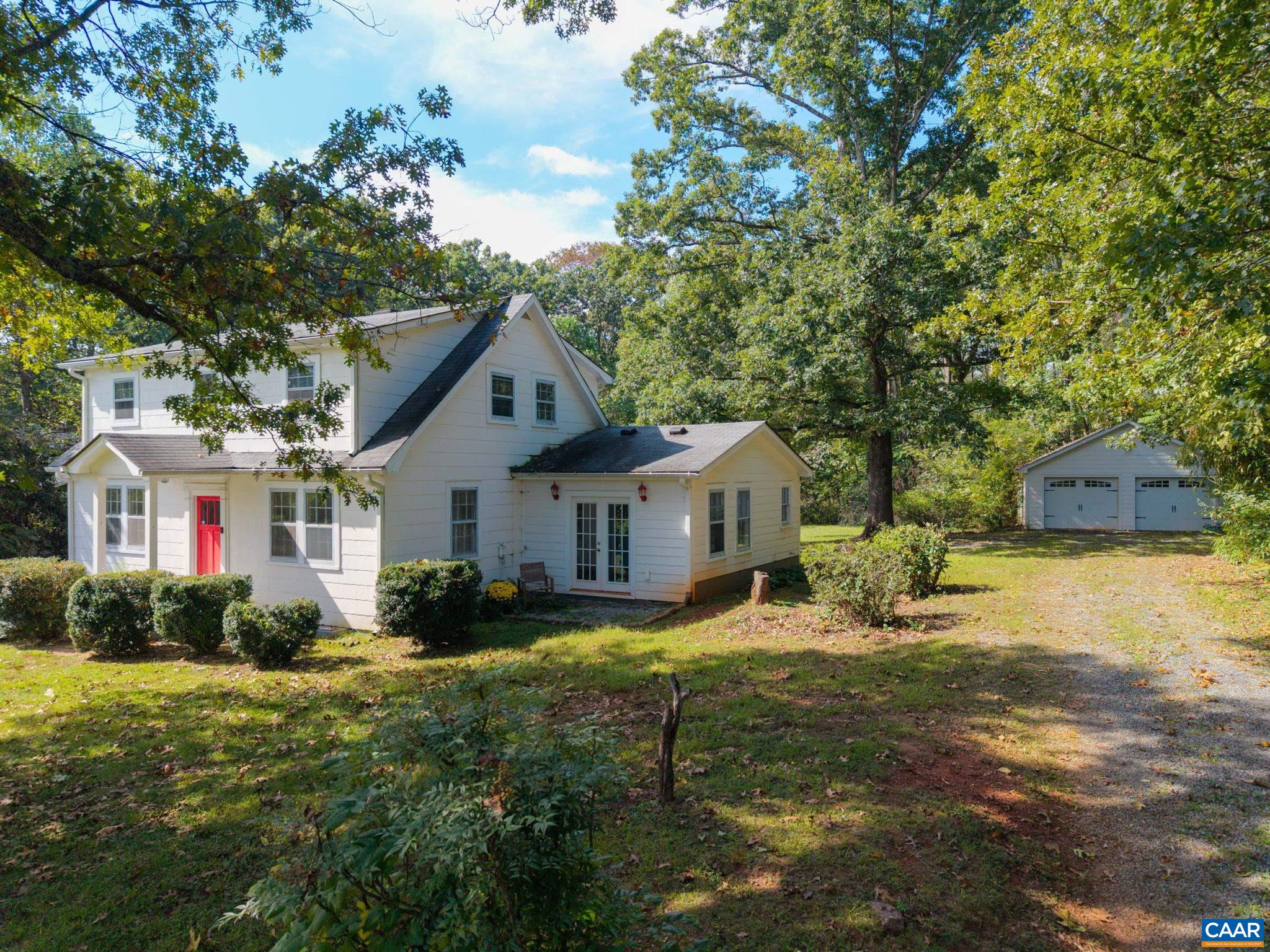 2514 Taylors Gap Road North Garden, VA 22959 - Photo 75 of 75 a front view of a house with a garden