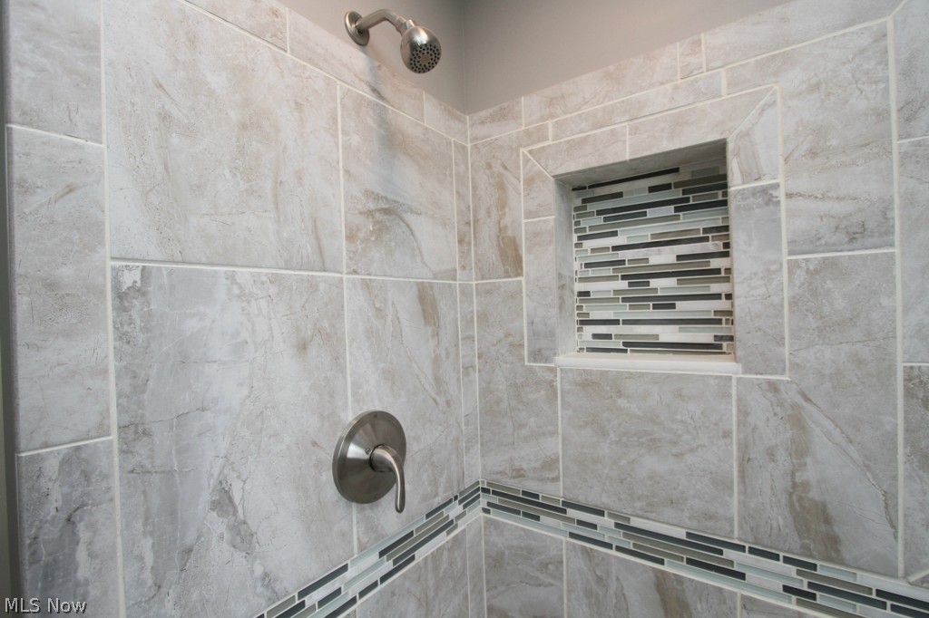 3666 Pennington Road Cleveland, OH 44120 - Photo 18 of 25 FULL BATHROOM CERAMIC TILE SHOWER