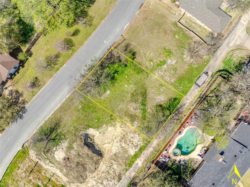 311 Arapaho W Road Sherman, TX 75092 - Photo 4 of 8 a view of a swimming pool with a patio
