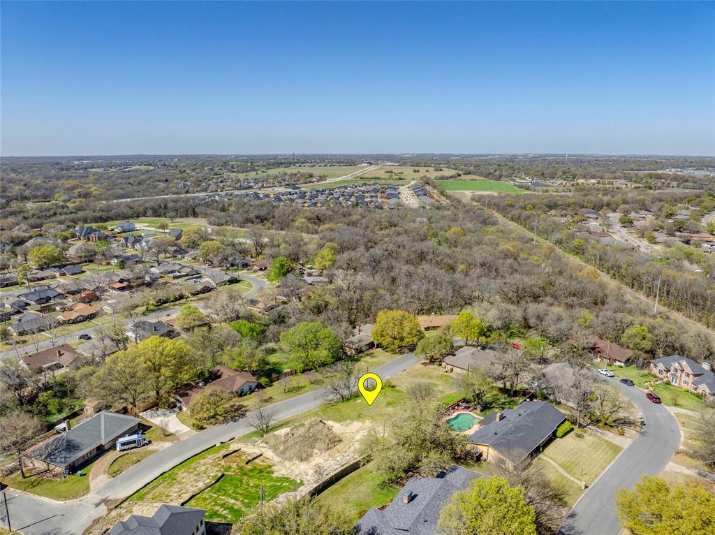 311 Arapaho W Road Sherman, TX 75092 - Photo 5 of 8 an aerial view of residential houses with outdoor space