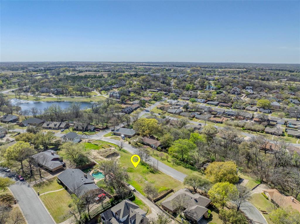 311 Arapaho W Road Sherman, TX 75092 - Photo 8 of 8 an aerial view of a residential houses with outdoor space