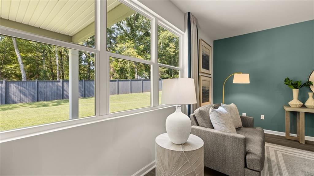 351 Bullock Pass Jefferson, GA 30549 - Photo 28 of 83 a living room with furniture and a large window