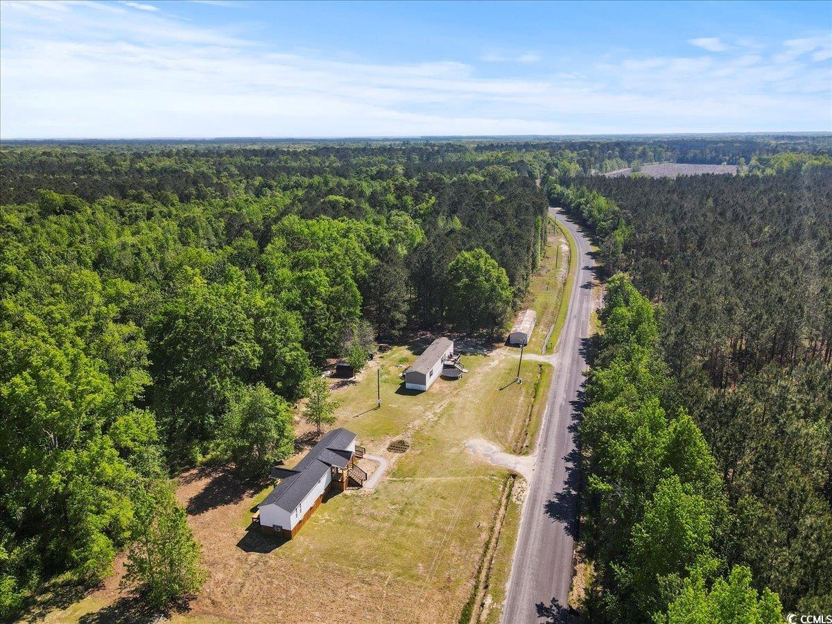 446 Sonny Road Gresham, SC 29546 - Photo 24 of 40 Aerial view featuring a wooded view
