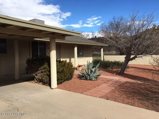 4165 North Pima Way Rimrock, AZ 86335 - Photo 1 of 22 a view of a house with a patio
