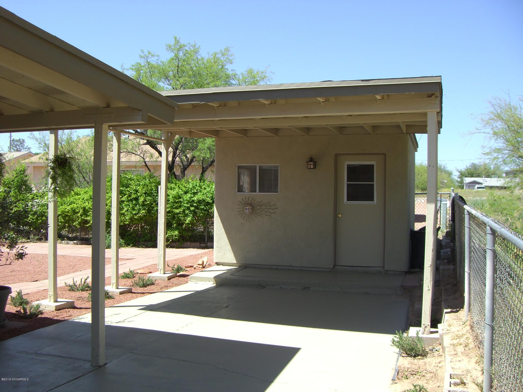 4165 North Pima Way Rimrock, AZ 86335 - Photo 19 of 22 a view of a house with a door