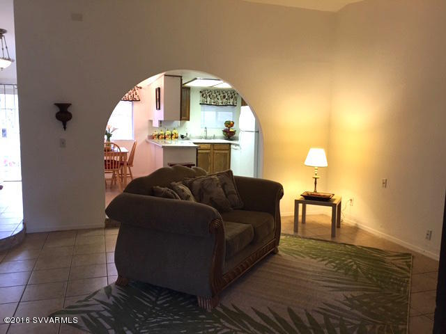 4165 North Pima Way Rimrock, AZ 86335 - Photo 3 of 22 a living room with a couch and a table