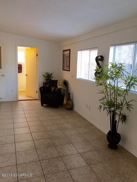 4165 North Pima Way Rimrock, AZ 86335 - Photo 8 of 22 a living room with furniture and a potted plant