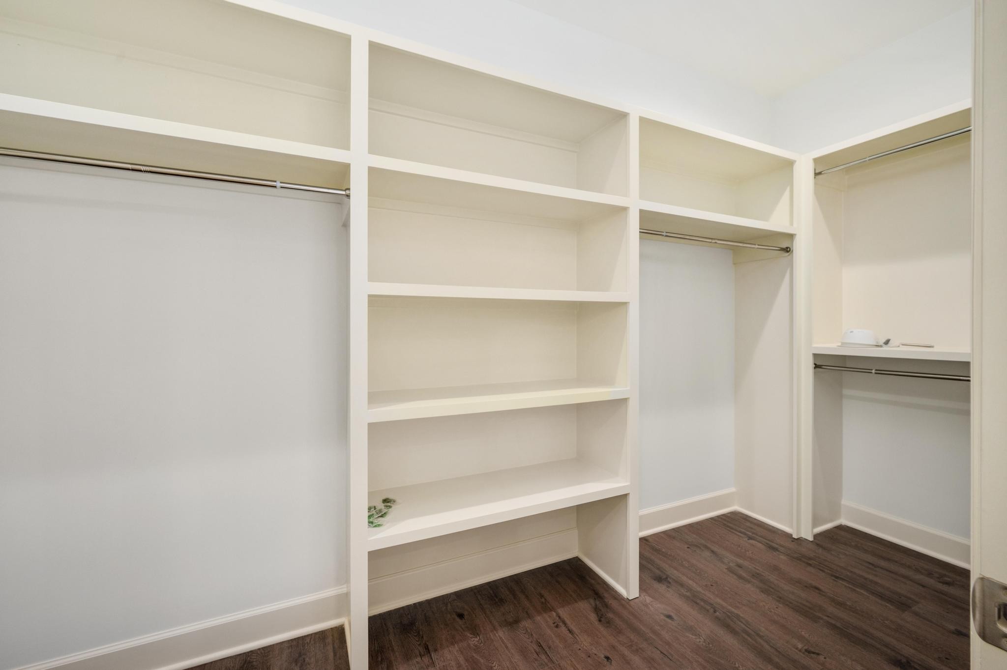 157 Lena Loop Burns, TN 37029 - Photo 20 of 49 a view of walk in closet with empty racks