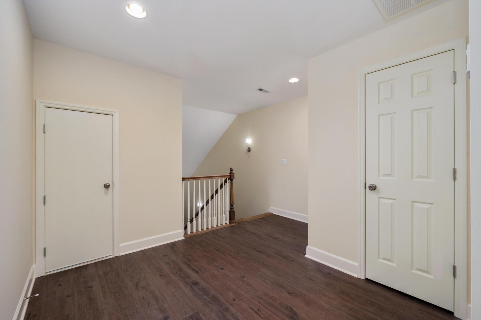 157 Lena Loop Burns, TN 37029 - Photo 26 of 49 a view of a hallway with wooden floor