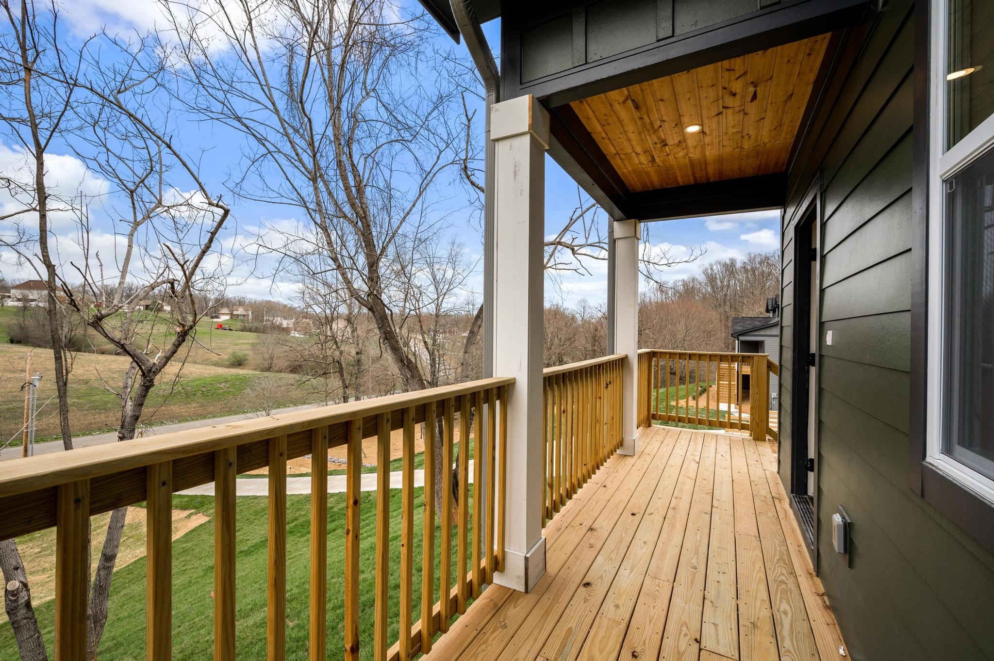 157 Lena Loop Burns, TN 37029 - Photo 28 of 49 a view of balcony with wooden floor