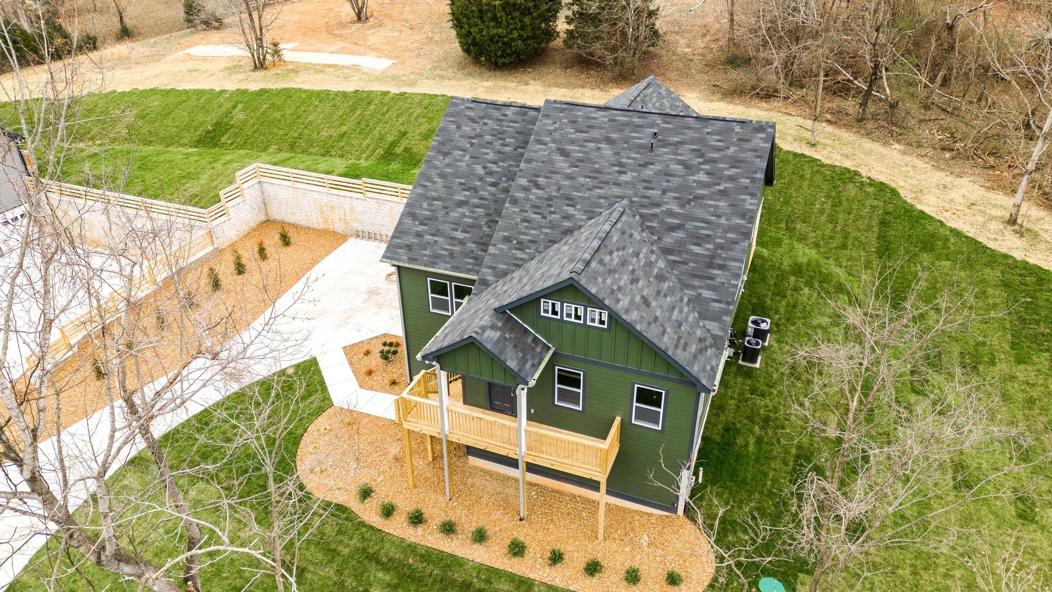 157 Lena Loop Burns, TN 37029 - Photo 40 of 49 a aerial view of a house with a yard