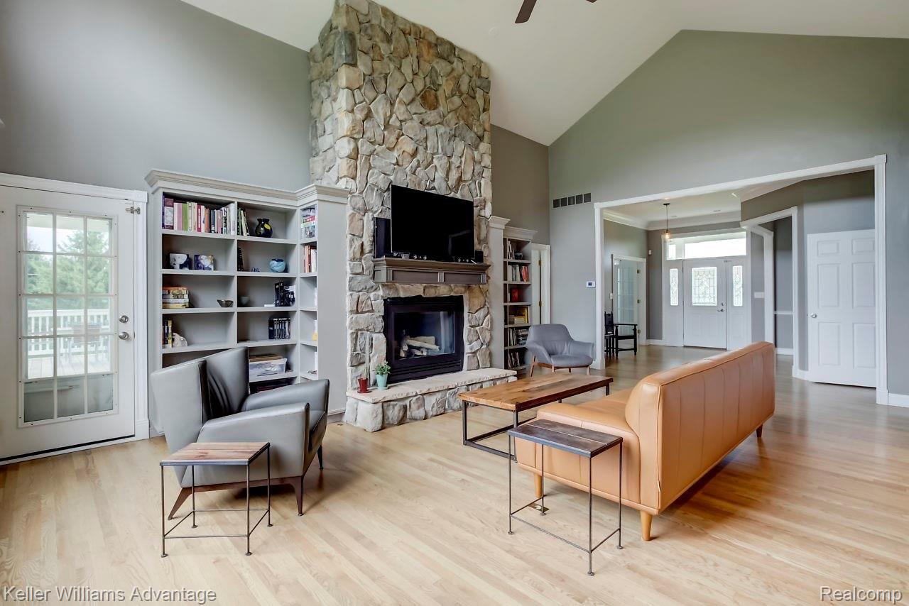 4558 Vines Road Howell, MI 48843 - Photo 6 of 46 Freshly refinished hardwood floors and professionally painted