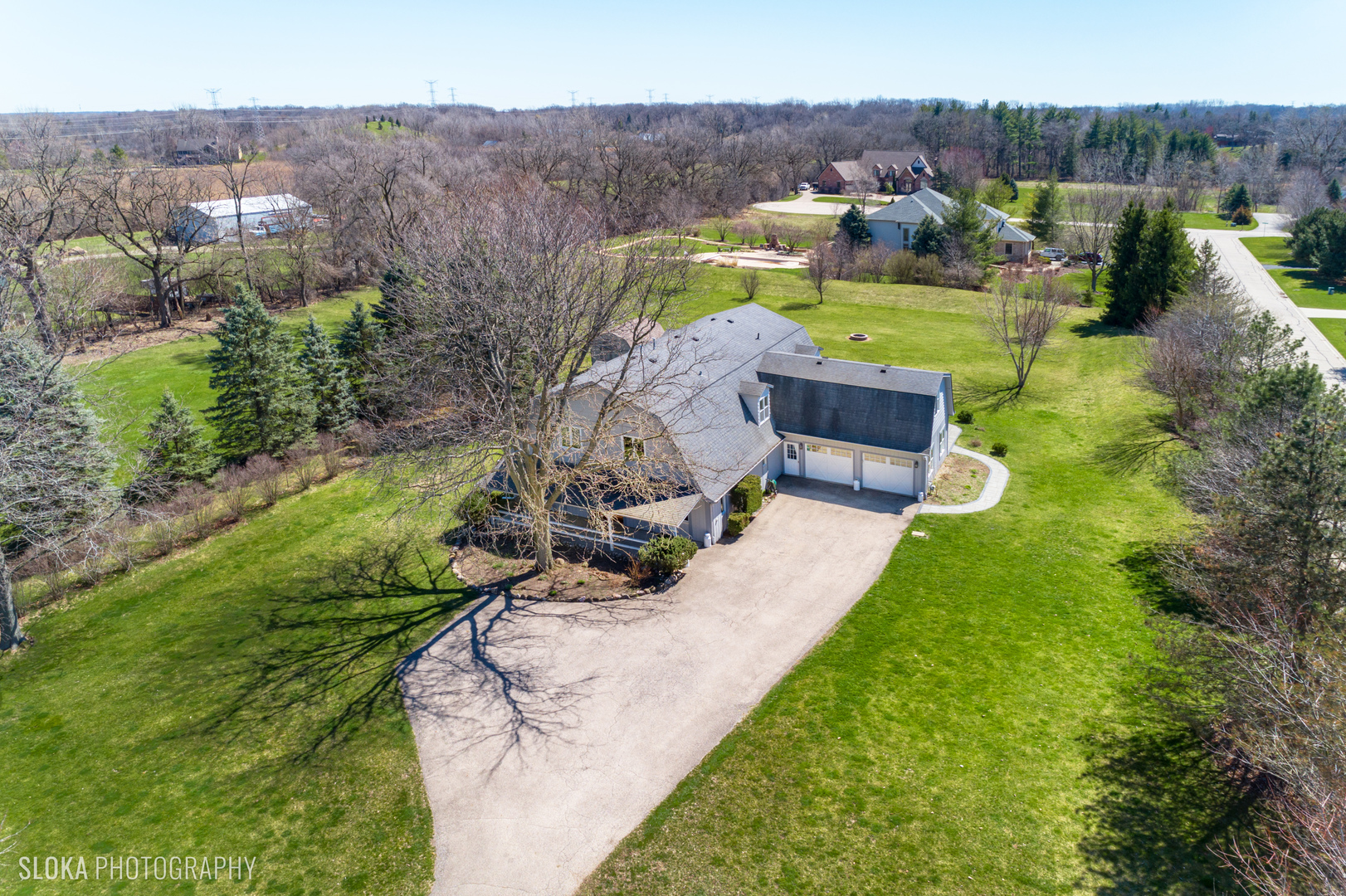 2401 West Wright Road Prairie Grove, IL 60012 - Photo 1 of 60 an aerial view of a house with outdoor space