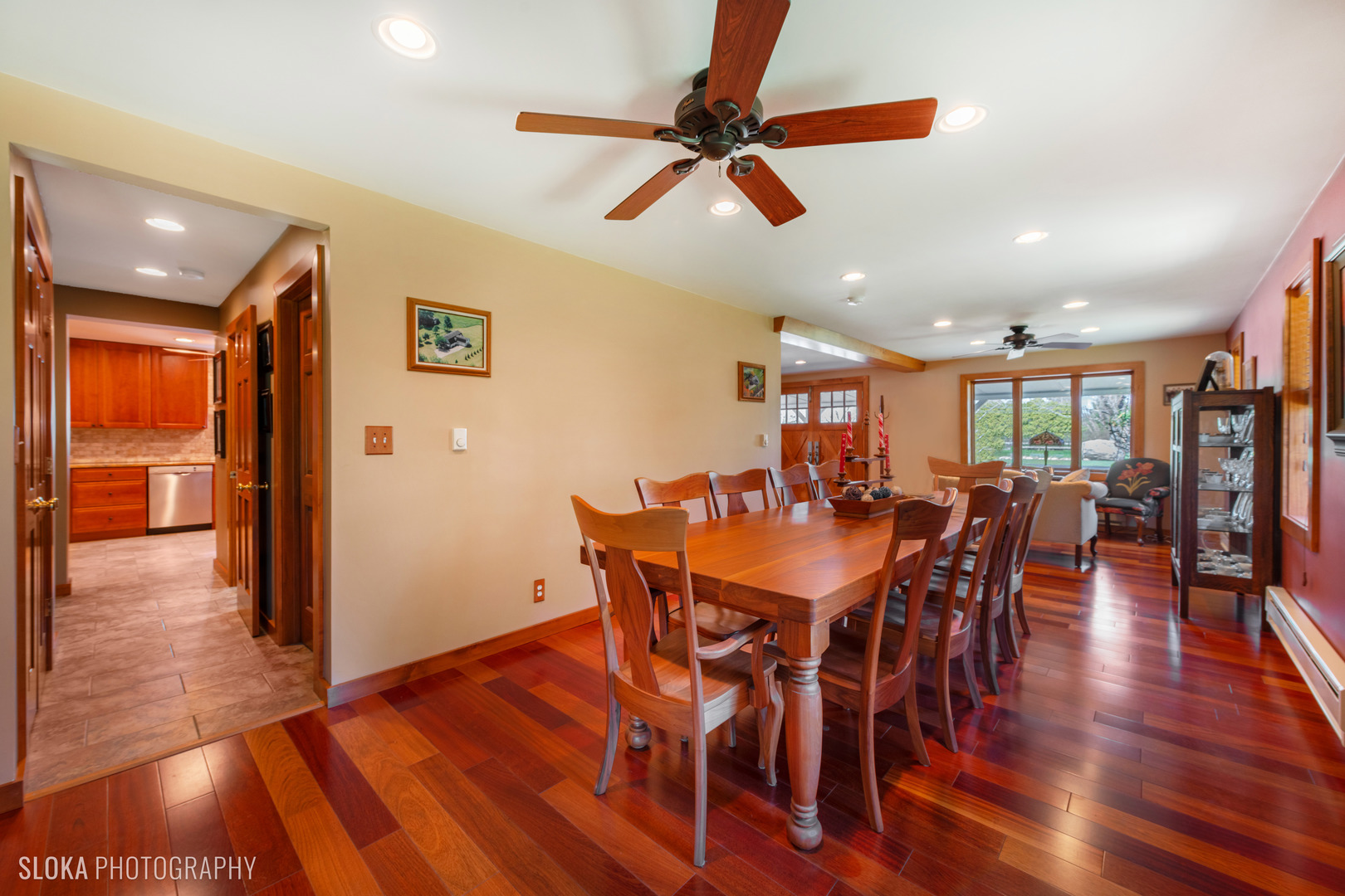 2401 West Wright Road Prairie Grove, IL 60012 - Photo 14 of 60 a view of a dining room with furniture and wooden floor