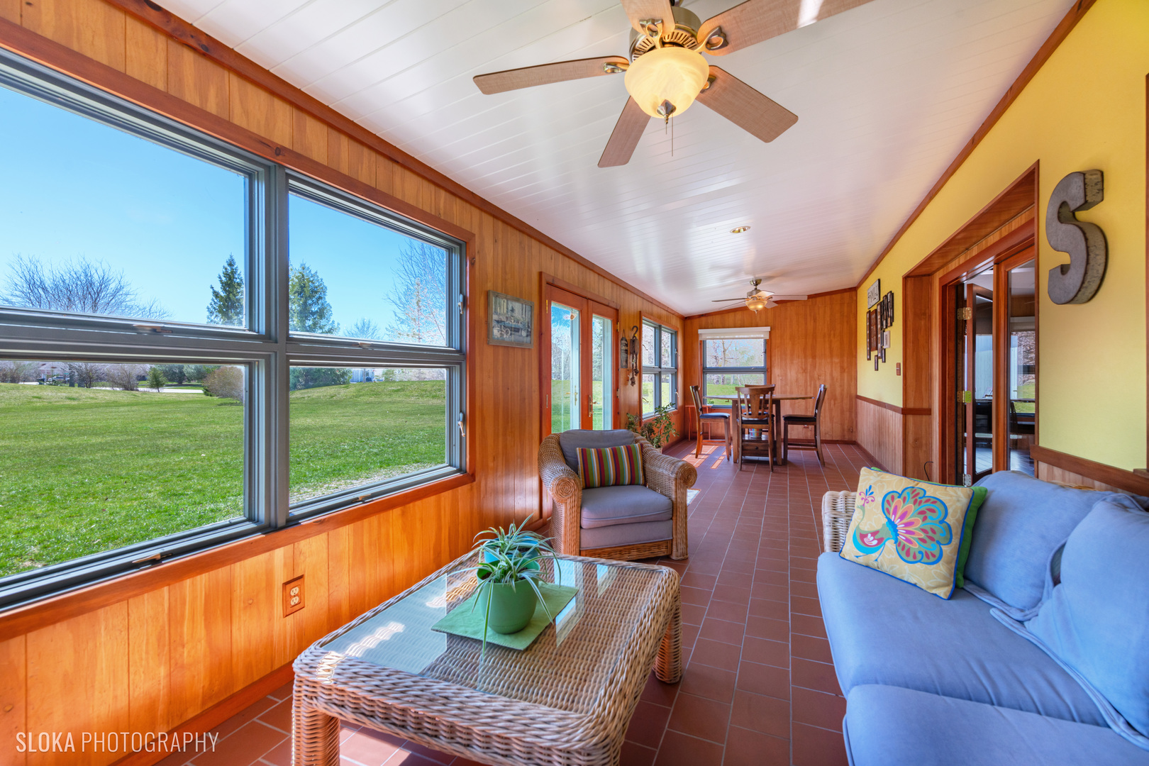 2401 West Wright Road Prairie Grove, IL 60012 - Photo 23 of 60 a living room with furniture and a floor to ceiling window