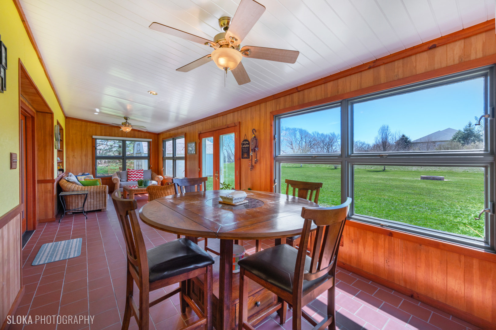 2401 West Wright Road Prairie Grove, IL 60012 - Photo 24 of 60 a view of a dining room with furniture window and wooden floor