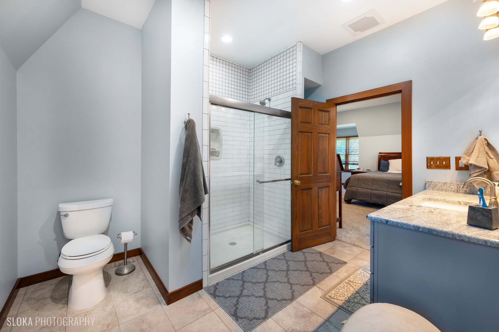 2401 West Wright Road Prairie Grove, IL 60012 - Photo 31 of 60 a bathroom with a toilet sink and shower