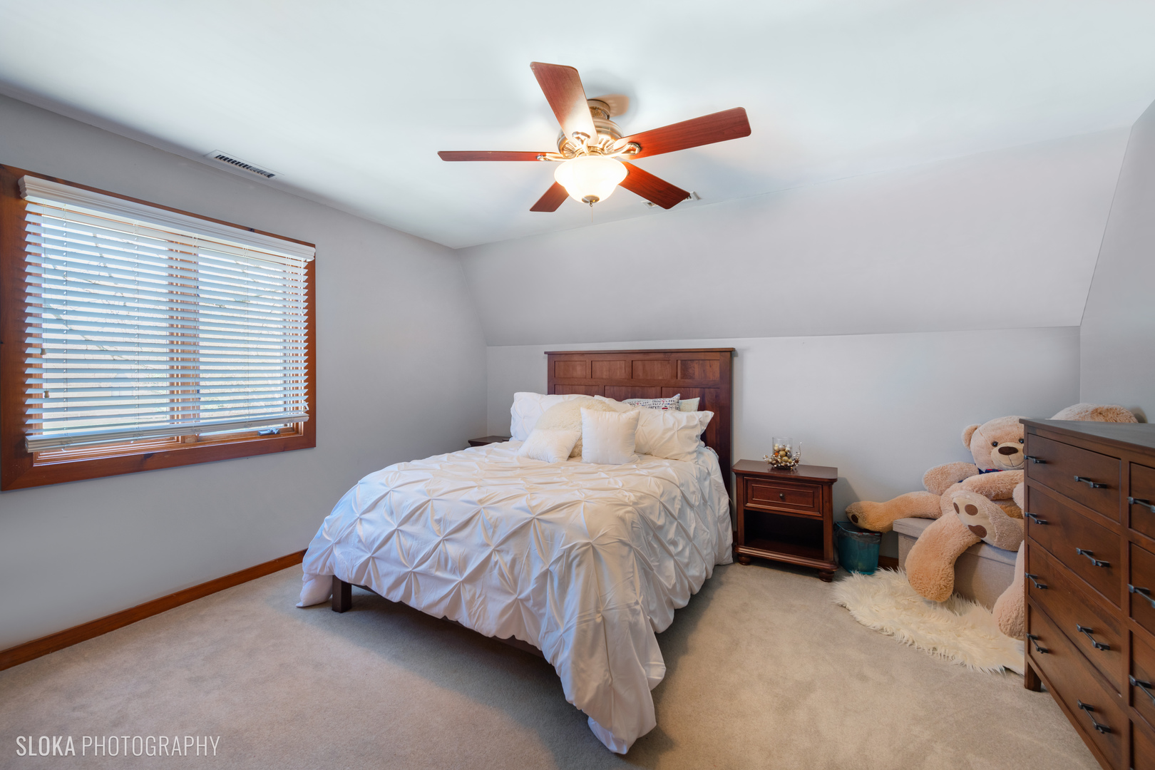 2401 West Wright Road Prairie Grove, IL 60012 - Photo 34 of 60 a bedroom with a bed and a chandelier