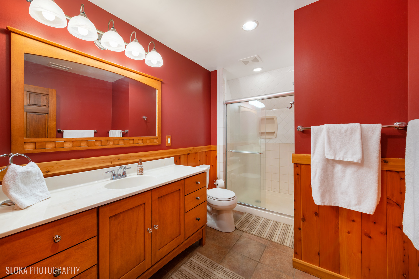 2401 West Wright Road Prairie Grove, IL 60012 - Photo 37 of 60 a bathroom with a sink a toilet and mirror