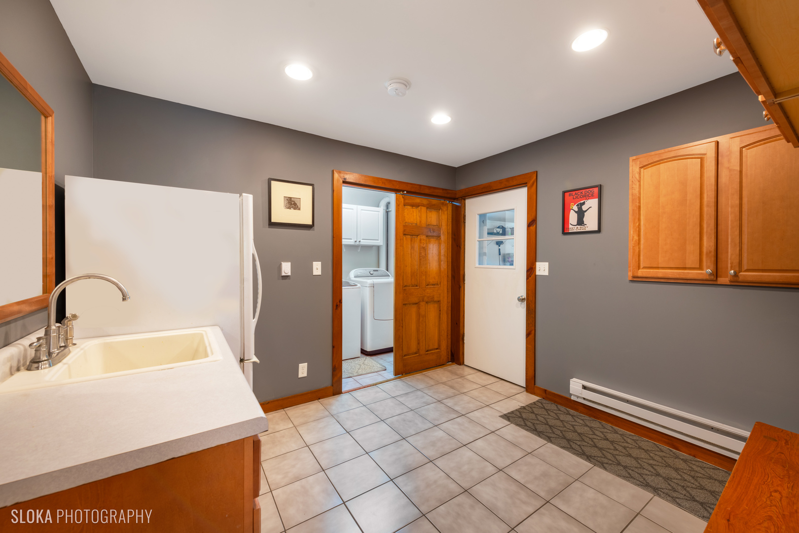 2401 West Wright Road Prairie Grove, IL 60012 - Photo 38 of 60 a room with a sink and a mirror