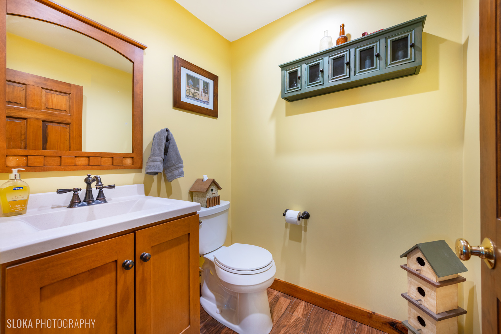 2401 West Wright Road Prairie Grove, IL 60012 - Photo 39 of 60 a bathroom with a sink a toilet and mirror