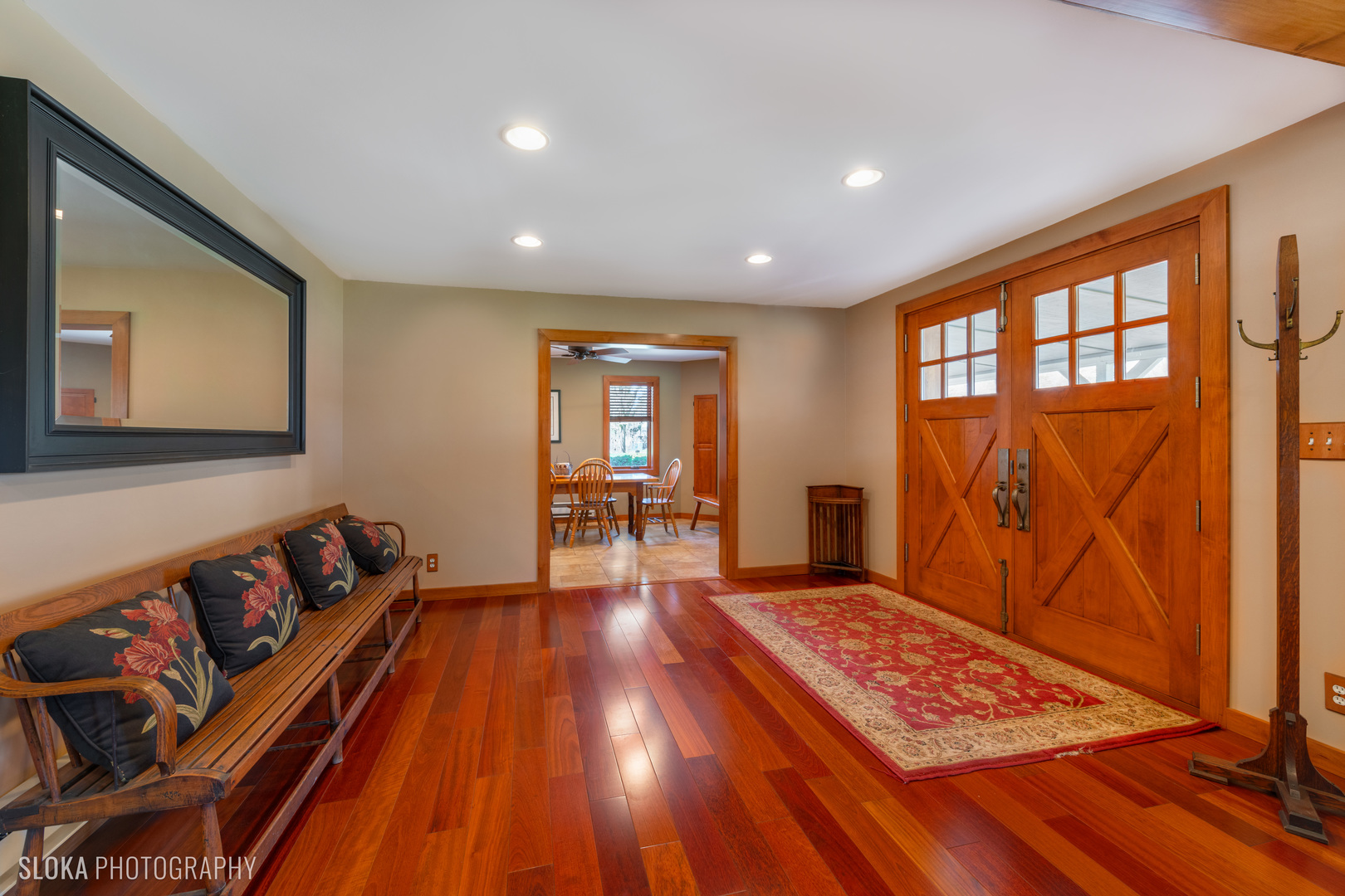 2401 West Wright Road Prairie Grove, IL 60012 - Photo 4 of 60 a living room with a couch and wooden floor