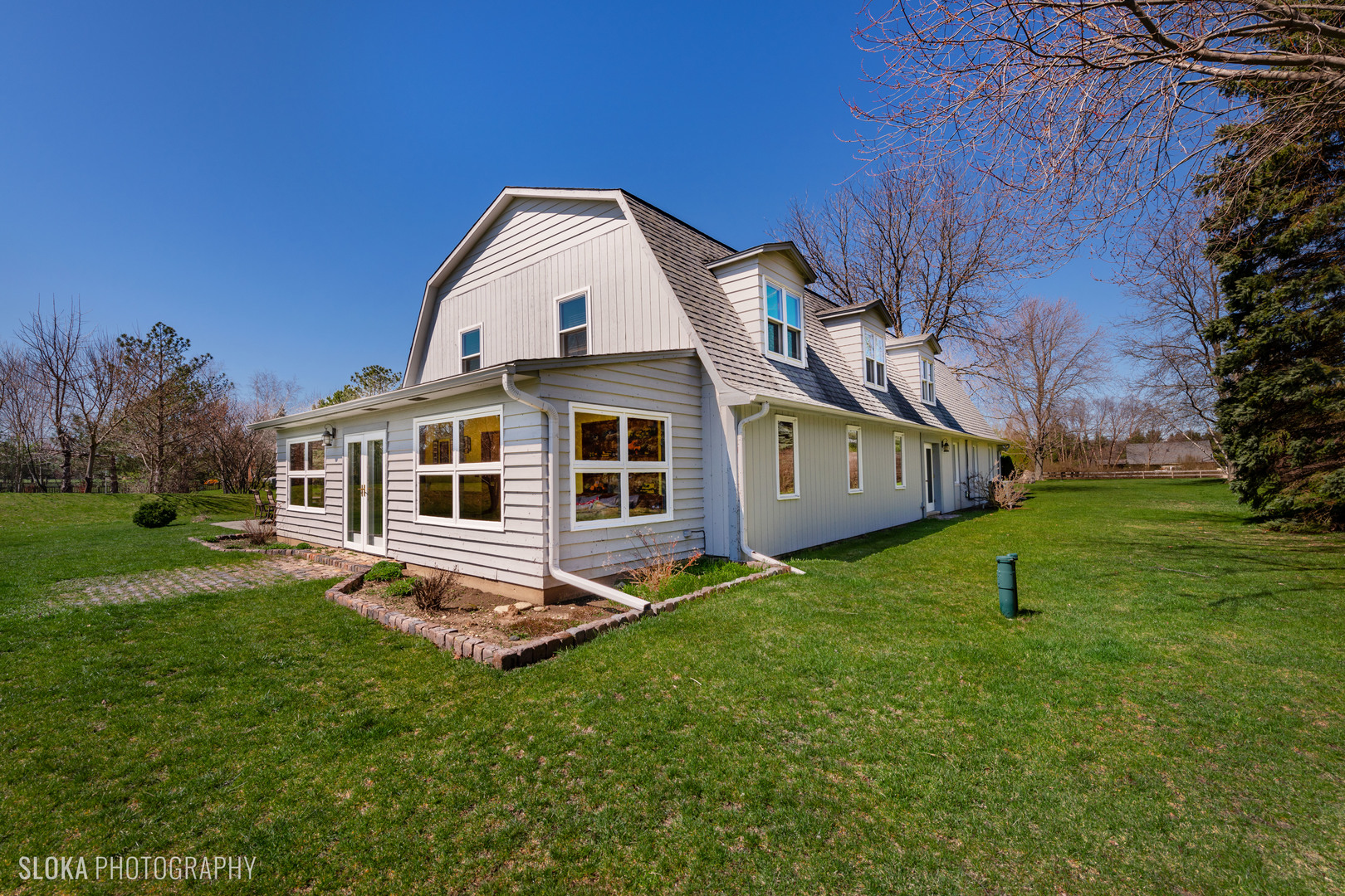 2401 West Wright Road Prairie Grove, IL 60012 - Photo 45 of 60 a front view of a house with a yard