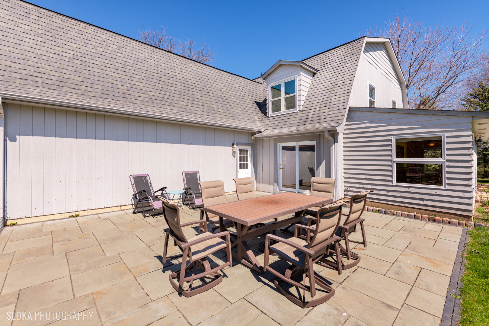 2401 West Wright Road Prairie Grove, IL 60012 - Photo 47 of 60 a patio with table and chairs and potted plants